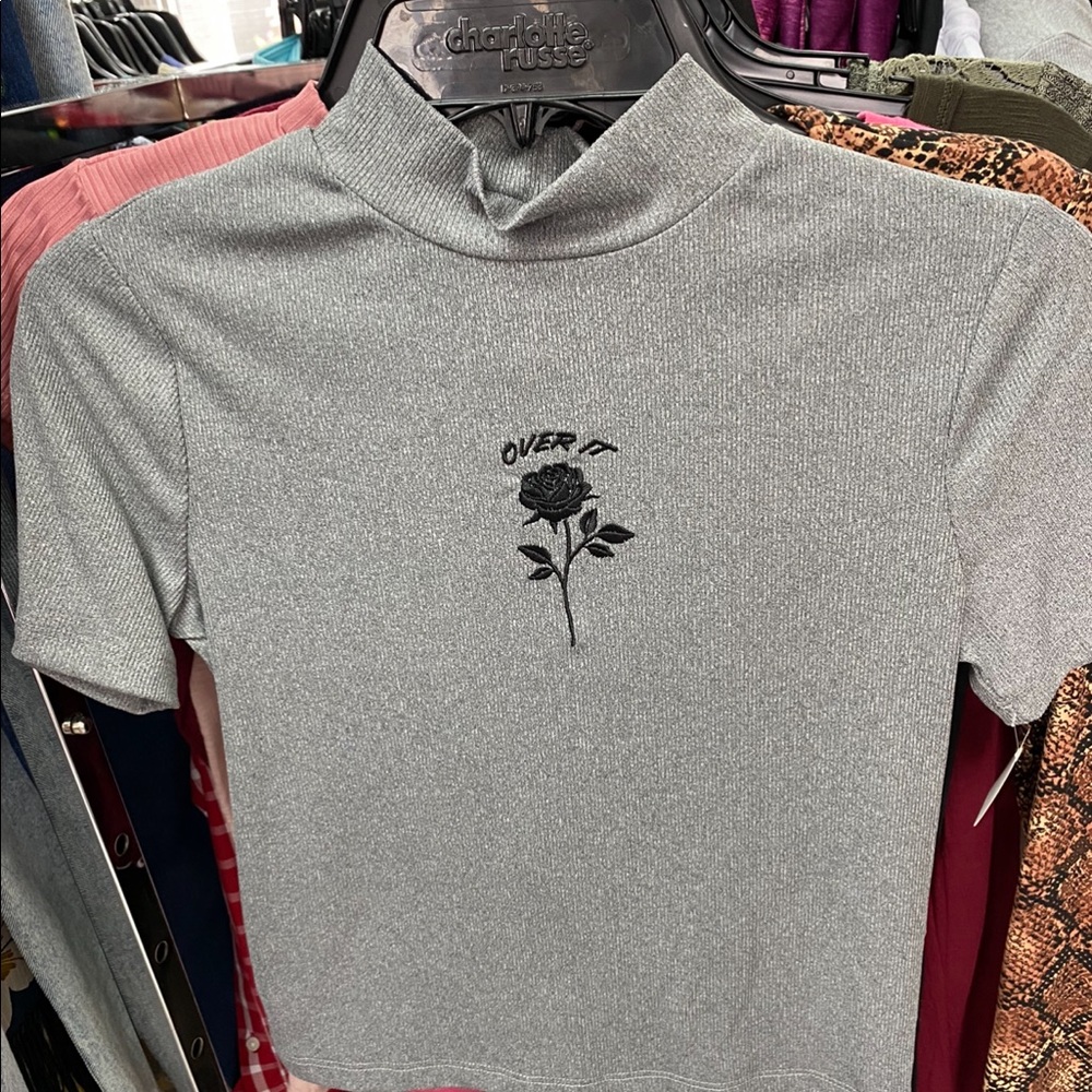 Gray crop top over it